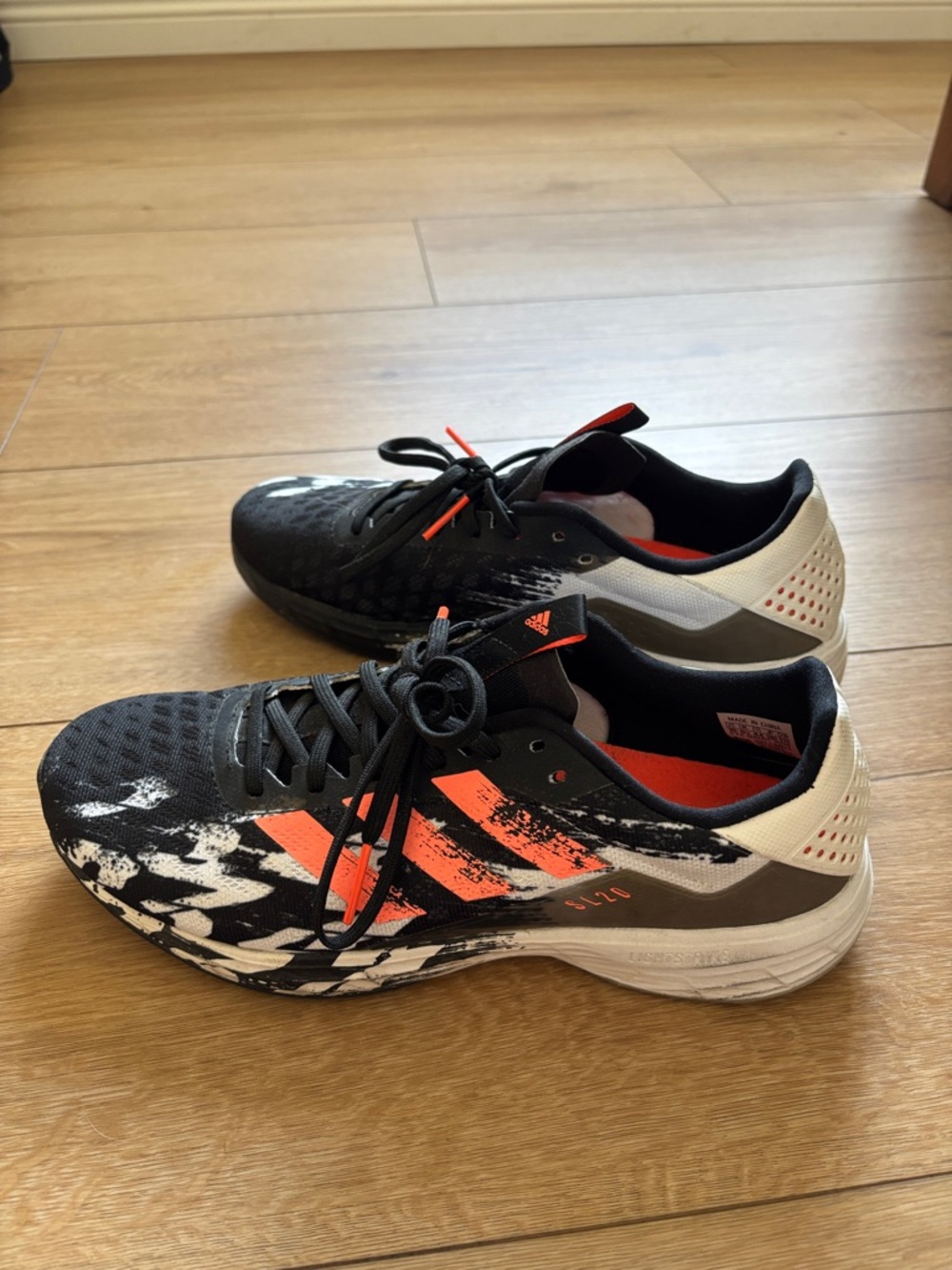 adidas Black, White & Neon Orange Graphic Running Sneakers